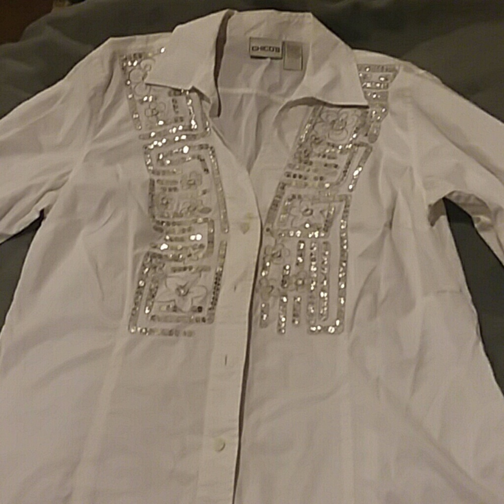 Women's top. Says size 1...im going to say small